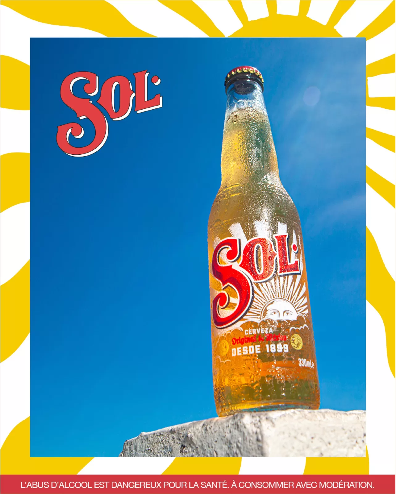Campagne Sol, bouteille sur fond bleu